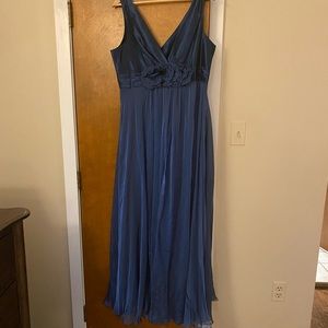 Beautiful blue evening gown with unique details.